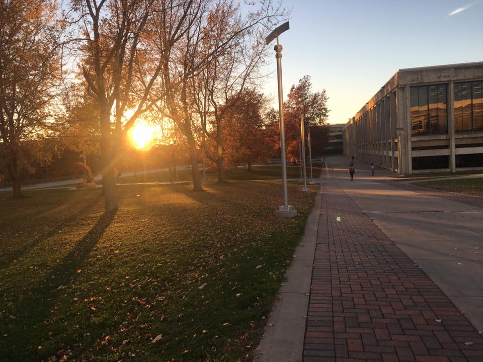 Sun setting over campus quad